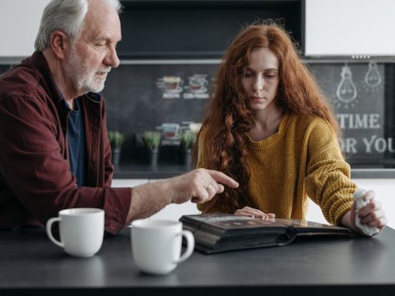 an-older-man-speaking-to-a-younger-woman-for-speech-therapy-memory-activities-for-adults